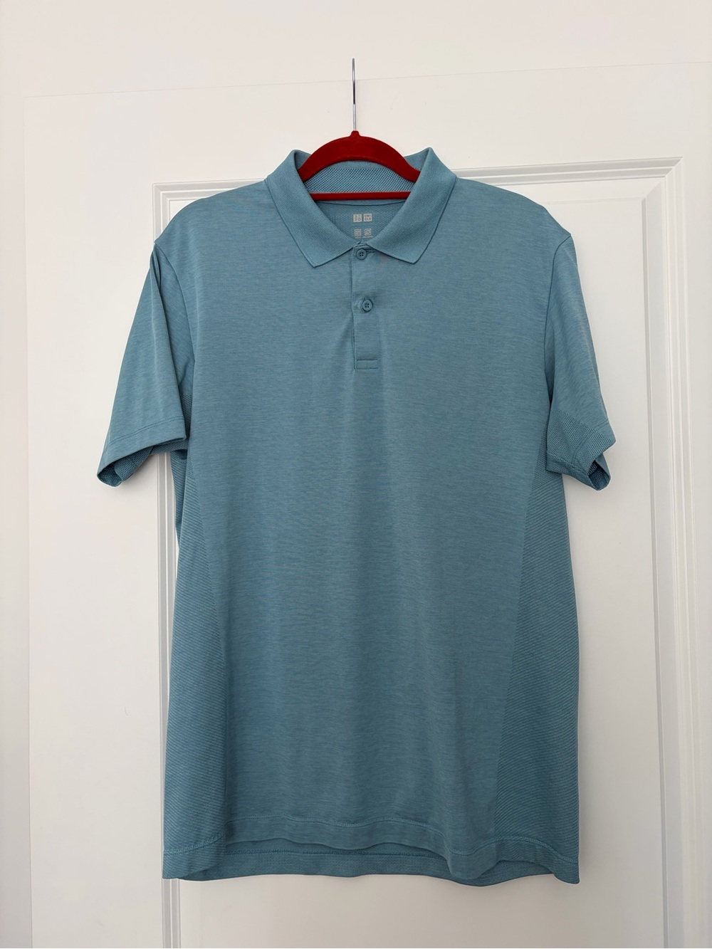 Uniqlo Men's Seafoam Blue Polo Shirt